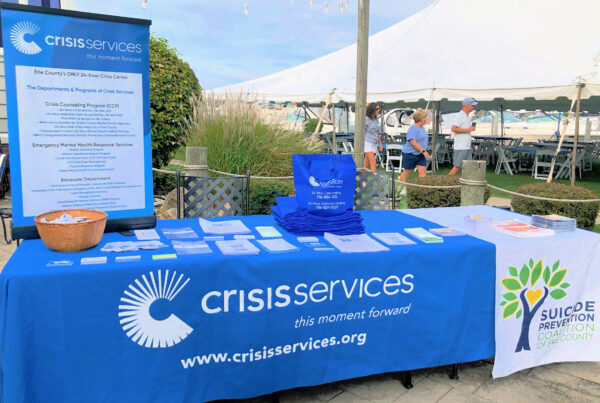 Photo of Crisis Services tabling setup at an event